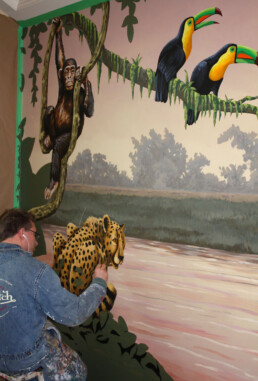 Flying colors murals, Edmonton mural company - painting an indoor mural for a partyroom
